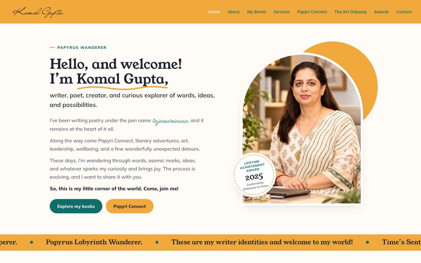 The new papyruswanderer.com home page with a marigold header, Komal Gupta's welcome message and an arch-framed portrait with an award badge